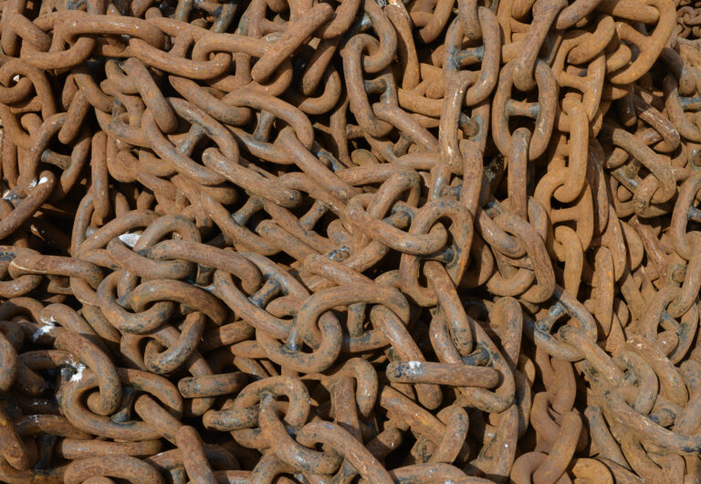 Steel Chain by Joost J. Bakker IJmuiden is licensed under CC BY 2.0.